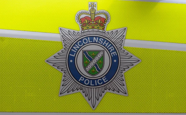Gros plan sur l'insigne de police du Lincolnshire — Photo