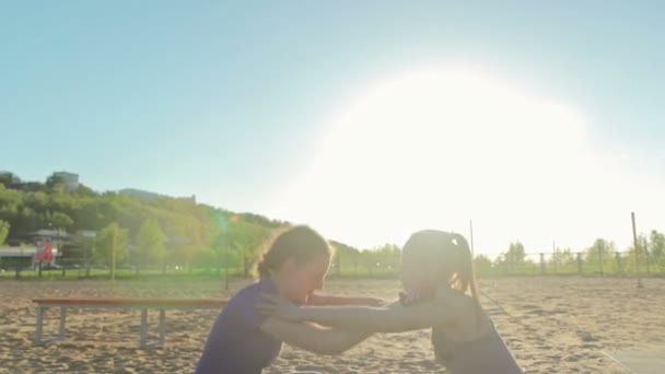 Girls squatting together, crossfit — Stock Video