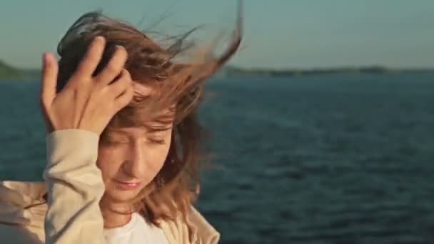 Close up shot of young woman on deck of cruise ship — Stock Video