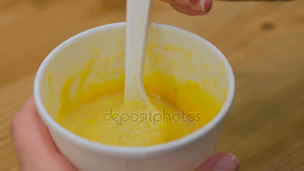 Woman stirring soup in cafe — Stock Video