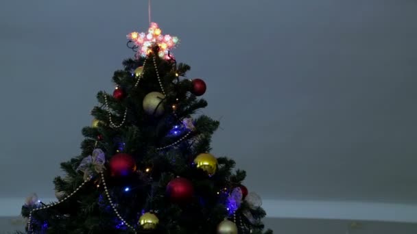 Christmas and New Year tree decoration, garland and toys — Stock Video