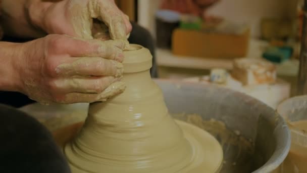 Professional male potter working in workshop — Stock Video