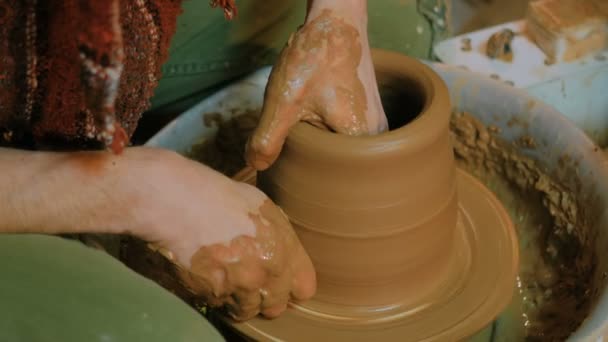 Professional male potter working in workshop — Stock Video