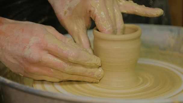 Professional male potter working in workshop — Stock Video