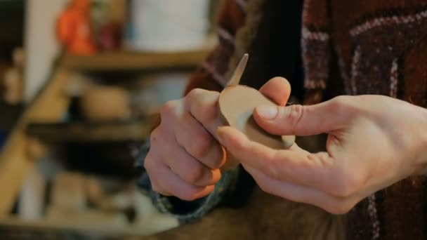 Professional male potter working in workshop, studio — Stock Video