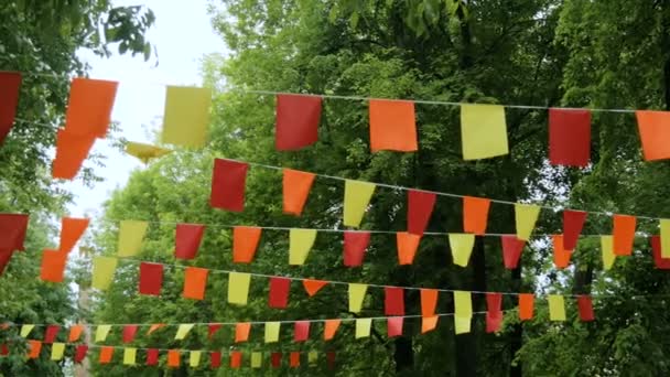 Decorative garlands of colorful rectangular flags — Stock Video