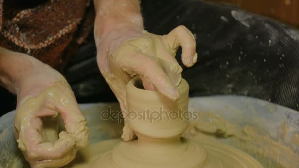 Professional male potter working in workshop — Stock Video