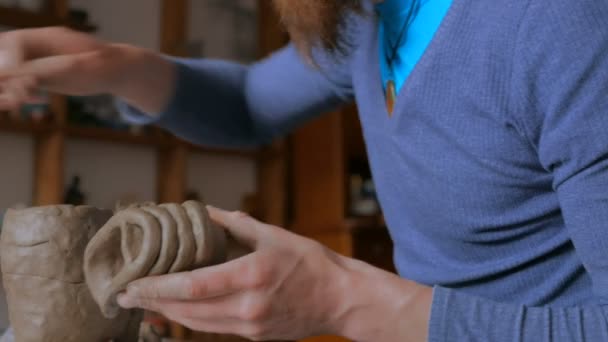 Man making mug in pottery studio workshop — Stock Video