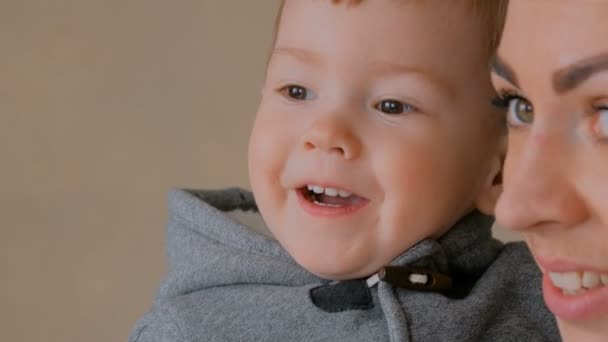 Happy young mother and her baby son playing togerher — Stock Video