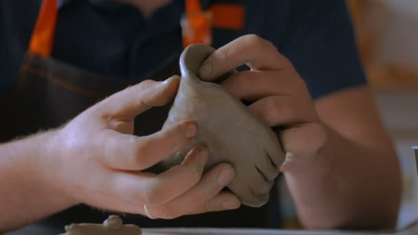 Man making mug in pottery studio workshop — Stock Video