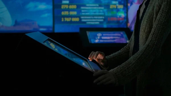 Woman using interactive touchscreen display