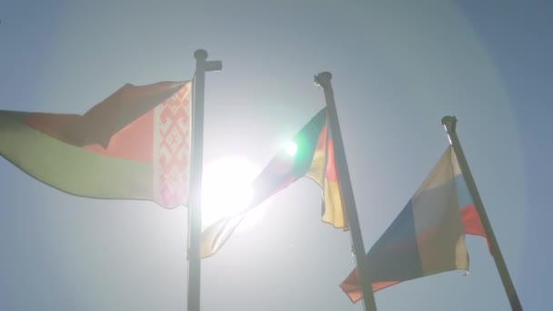 Super slow motion - colorful flags fluttering in the wind - diplomacy concept — Stock Video