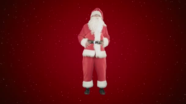 Feliz Navidad Santa Claus divertirse y bailar sobre fondo rojo con nieve — Vídeos de Stock