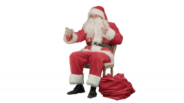 Santa gör selfie med smartphone på vit bakgrund — Stockvideo