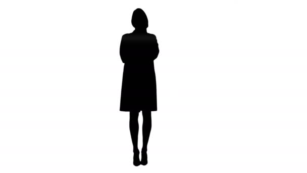 Silhouette Young doctora confiada posando con un dedo levantado — Vídeo de stock