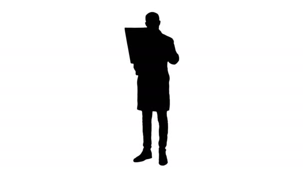Mannelijke arts silhouet Xray resultaten analyseren — Stockvideo