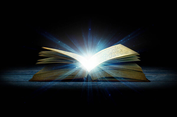Open glowing magical book