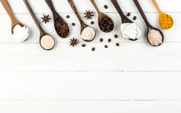 Homemade coconut products on white wooden table background. Oil, — Stock Photo, Image