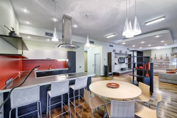 Interior of the kitchen-living room in a modern house.