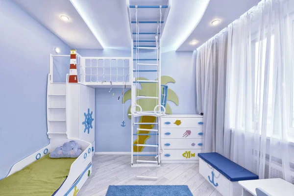 The interior of a children\'s bedroom for a boy in a marine style.