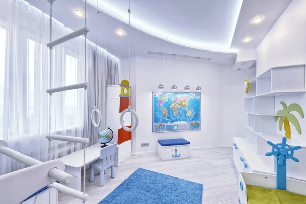 The interior of a children\'s bedroom for a boy in a marine style.