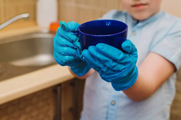 Boy Helps His Mom Perform Housework Boy Protective Blue Rubber — Stock Photo, Image