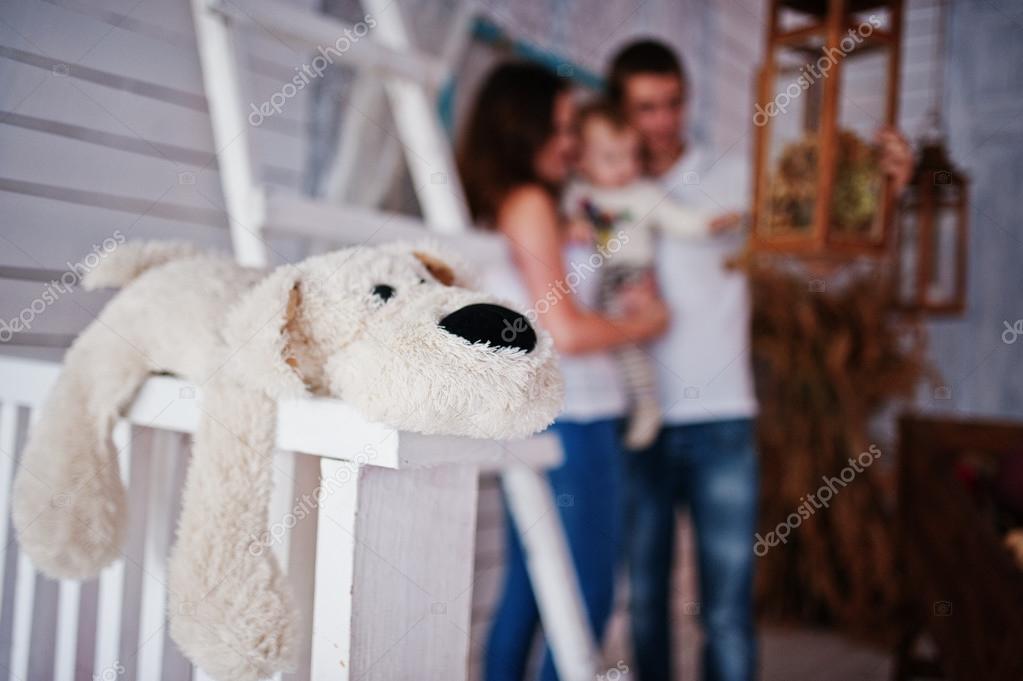 Soft Toy Dog Background Happy Family Stay Near Wooden Ladder Wi Soft Toy Dog Background Happy Family Stay Near Wooden Ladder Wi Stock Photo