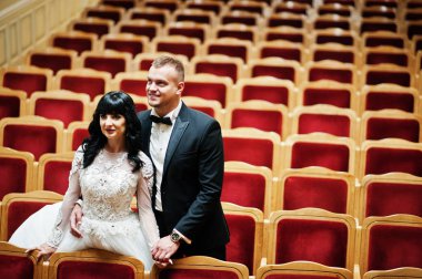 Hall amfitiyatro kırmızı sandalye Çifte düğün.