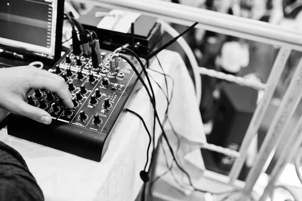 Hand of man on digital mixing console. Sound mixer control panel — Stock Photo, Image