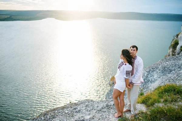 Couple wearing on dress with a pattern at beautiful landscape, o — Stock Photo, Image