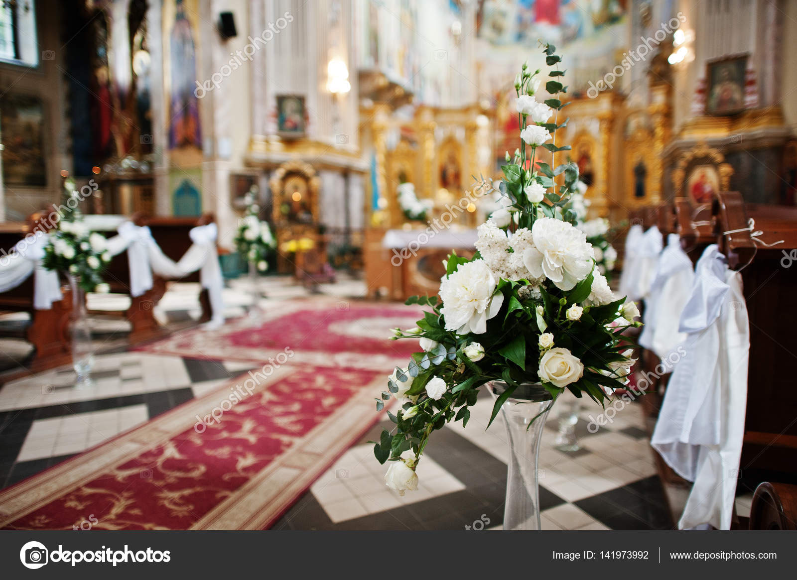 Decoration Of Flowers On Vases At Church On Wedding Ceremony