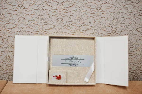 Elegant wedding album and photo book from beige material. — Stock Photo, Image