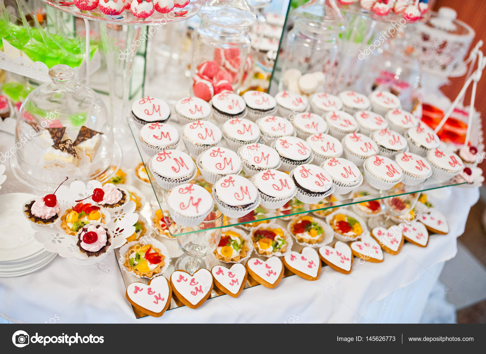 Different Sweets And Cupcakes At Catering Wedding Reception Tabl