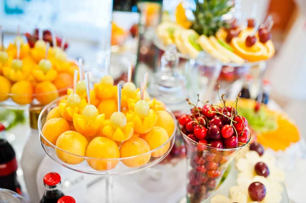 Different fruits with apricot and cherry at catering wedding rec — Stock Photo, Image
