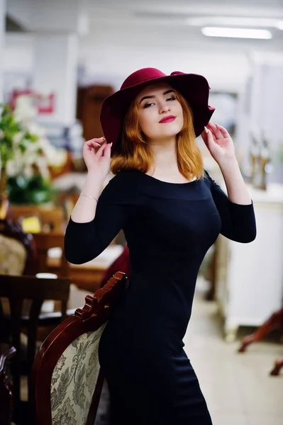 Portrait of fashion red haired girl on red hat and black dress w — Stock Photo, Image