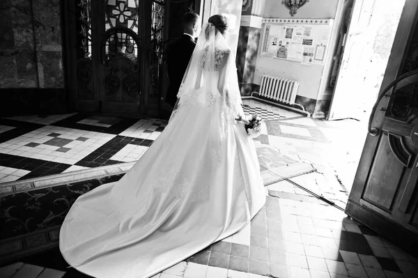 Wedding couple walking happy in love at church. — Stock Photo, Image