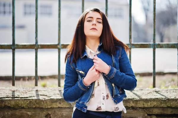 Young stylish brunette girl on shirt, pants, jeans jacket  posed — Stock Photo, Image