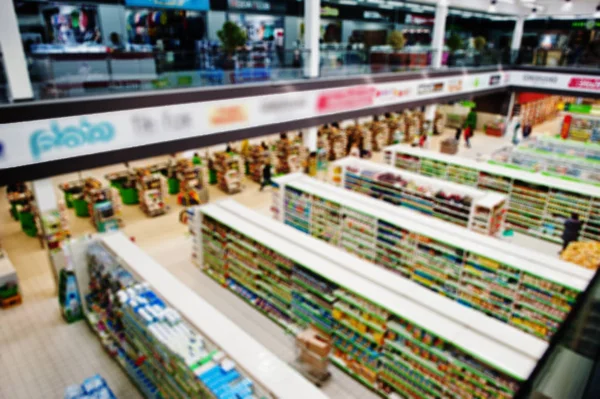 Flou efect de allée et étagères de supermarché. Vue d'en haut . — Photo