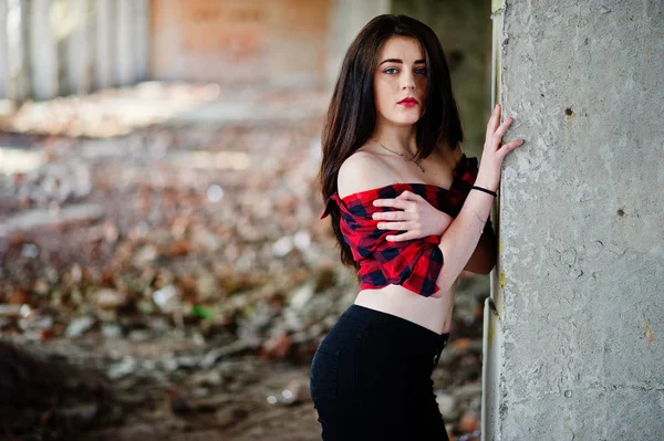 Portrait girl with red lips wearing a red checkered shirt with b — Stock Photo, Image