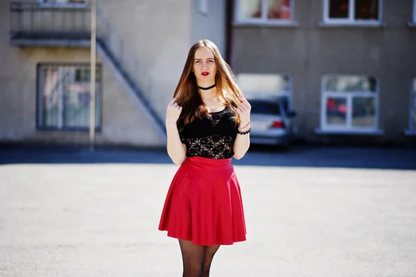 Portrait of girl with black choker necklace on her neck and red — Stock Photo, Image