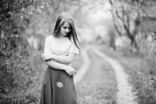 Portrait of beautiful girl with red lips at spring blossom garde — Stock Photo, Image