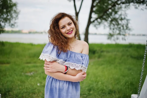 Portrait of a fantastic young girl having fun in the park next t — Stock Photo, Image