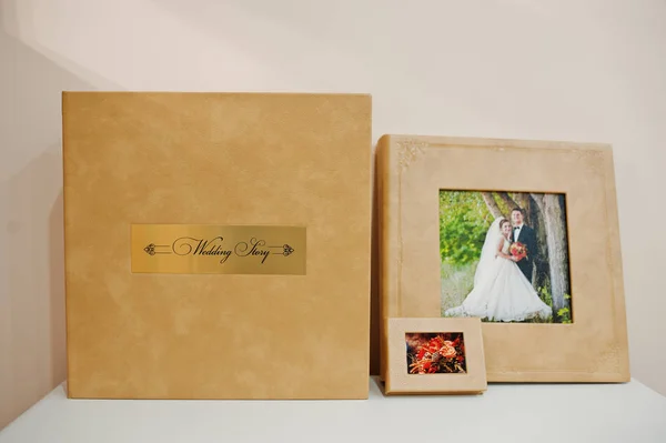 Elegant orange brown photobook or photo album on the sofa. — Stock Photo, Image