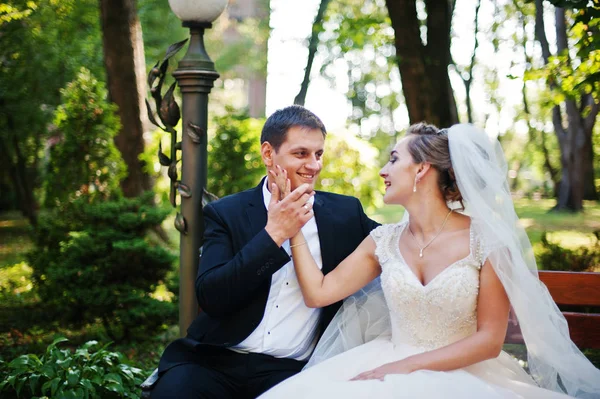 Fantastic wedding couple walking in the park on their wedding da — Stock Photo, Image