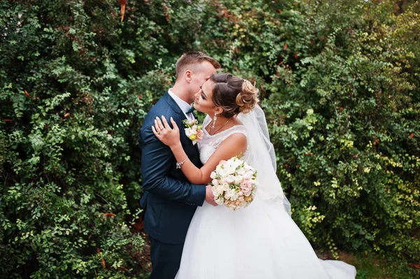 Good-looking newly married couple walking and enjoying each othe — Stock Photo, Image