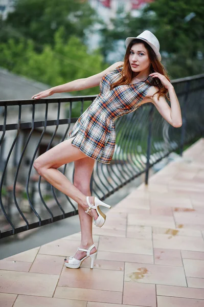 Amazing long legs with hig heels girl wear on hat posing near th — Stock Photo, Image