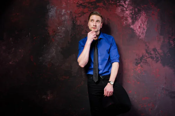 Studio portrait of stylish man, wear on blue shirt and necktie. — Stock Photo, Image