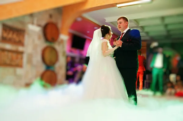 Happy young wedding couple dancing their first dance with differ — Stock Photo, Image