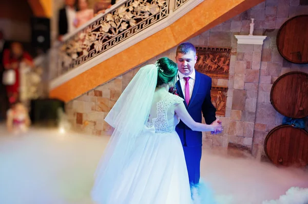 Happy young wedding couple dancing their first dance with differ — Stock Photo, Image