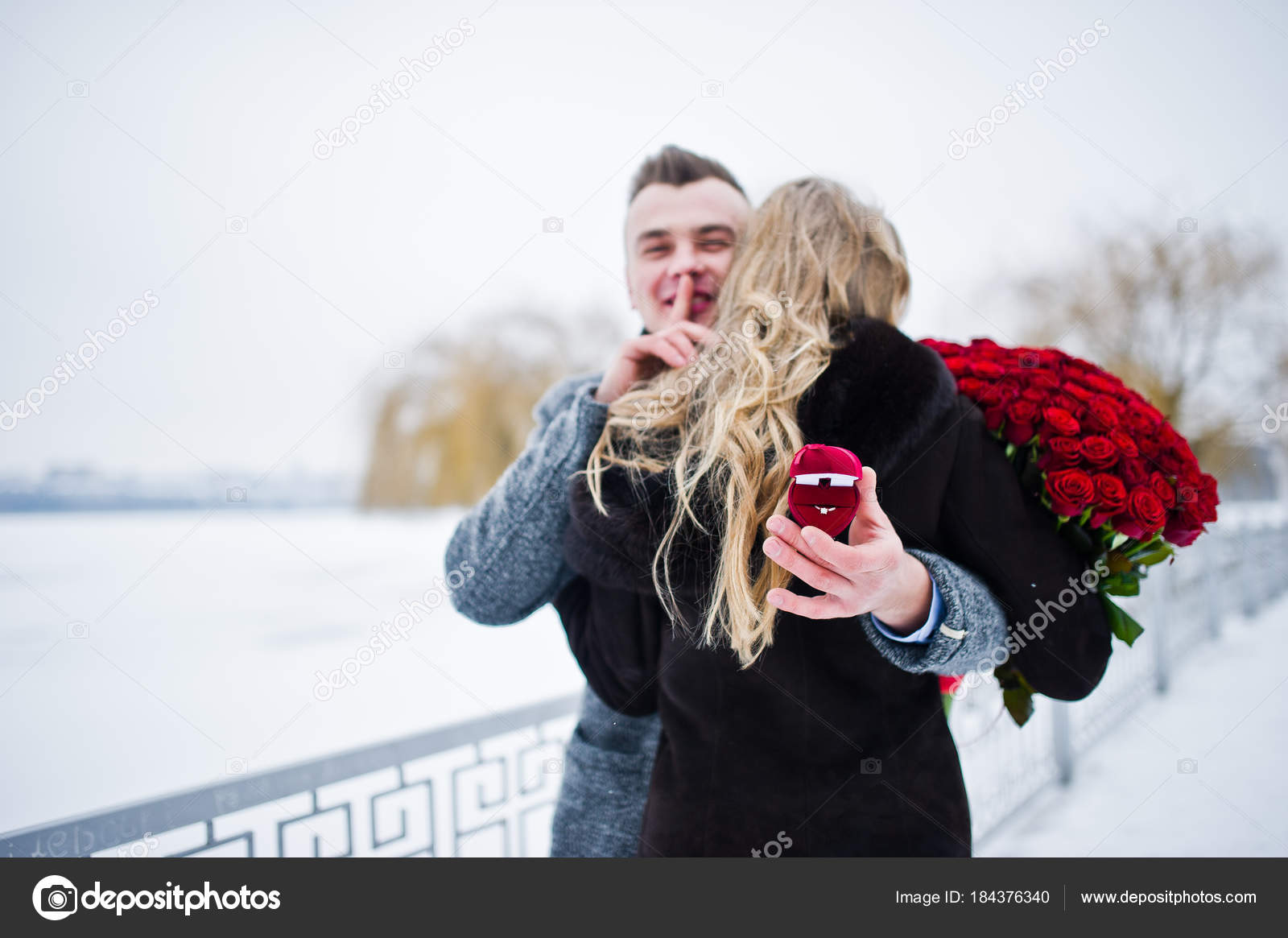Married proposal with 101 rose at winter Loving couple